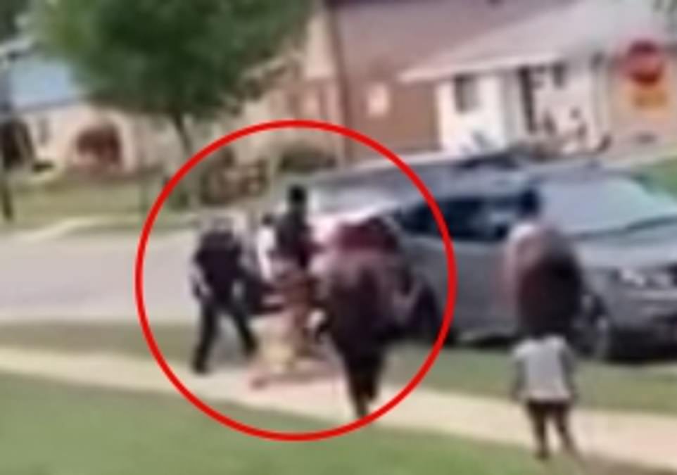 2nd Cell video – Blake wrestling with two officers beside the SUV prior to the shooting (DM)2
